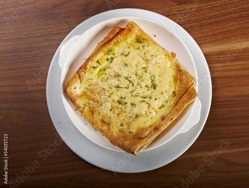 Qutab -baked  lavash cheese pie