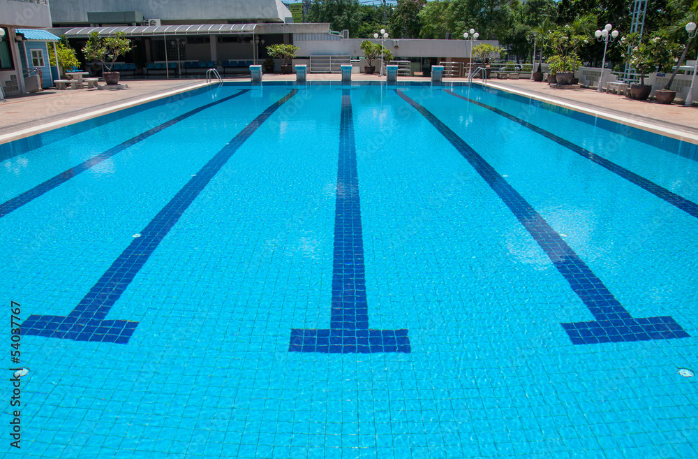 blue swimming pool and starting places at sport center