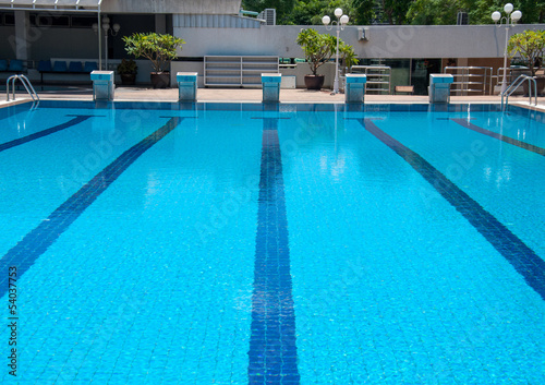 blue swimming pool and starting places at sport center