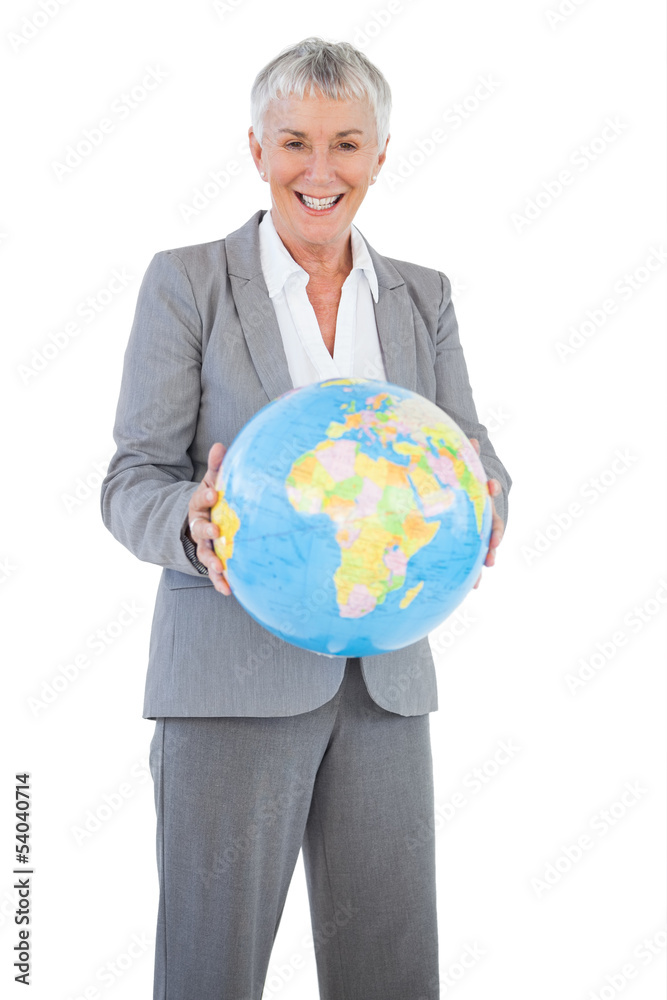 Smiling businesswoman holding globe Smiling businesswoman holding globe
