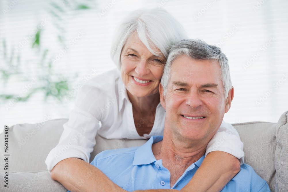 Portrait of a woman hugging husband Portrait of a woman hugging husband