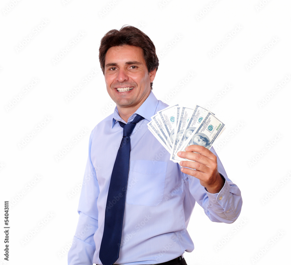 Smiling business man holding up cash money Smiling business man holding up cash money