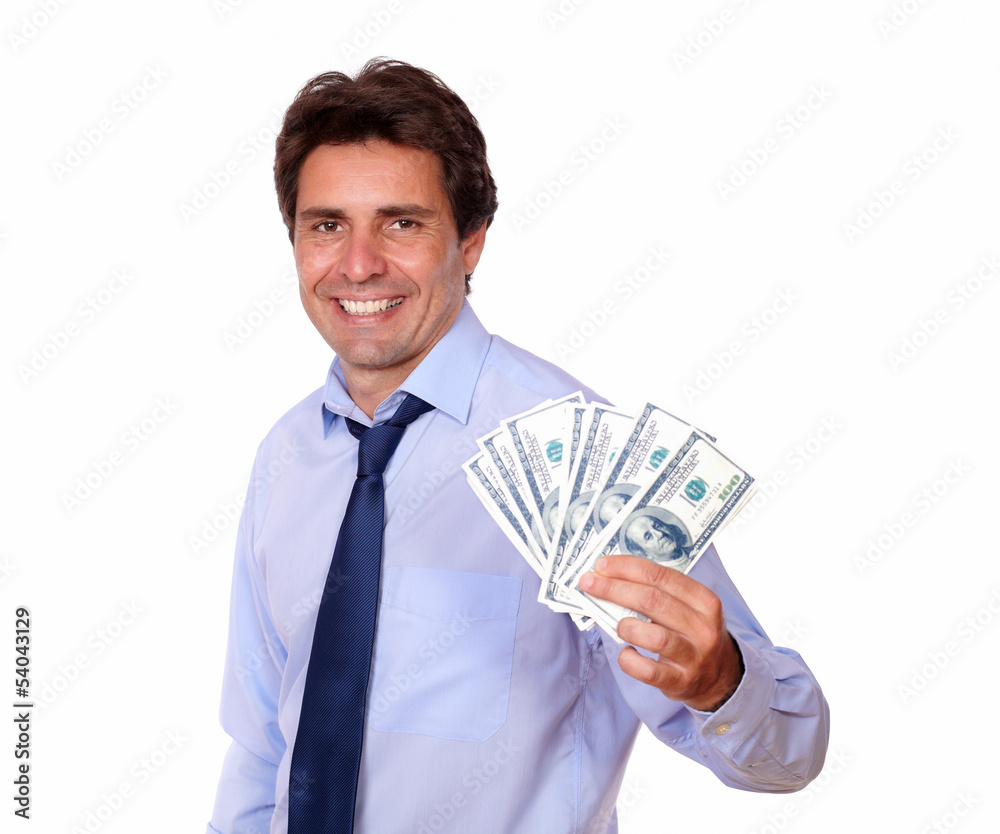 Attractive business man holding up cash money Attractive business man holding up cash money