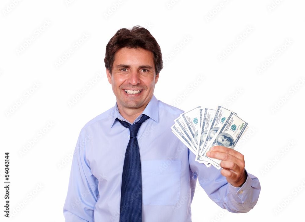 Attractive business man holding up cash dollars Attractive business man holding up cash dollars