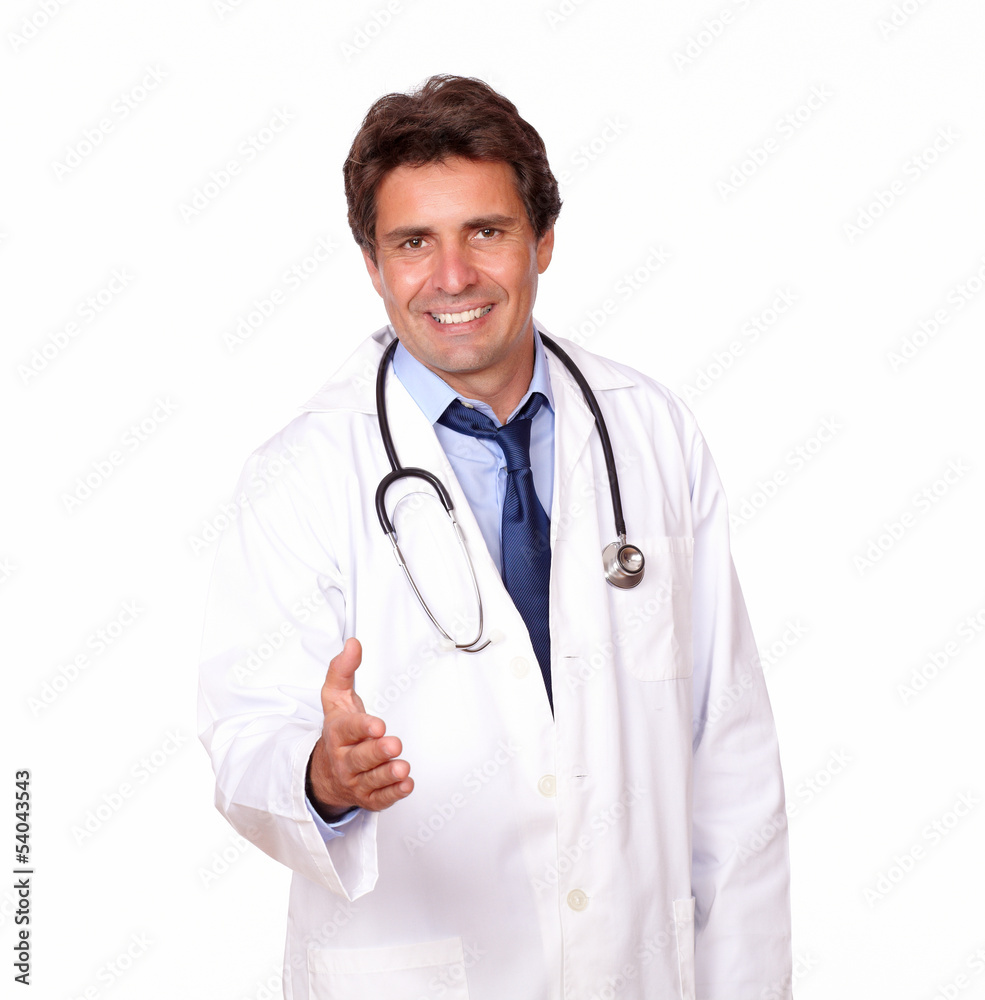 Smiling medical doctor extending handshake at you Smiling medical doctor extending handshake at you