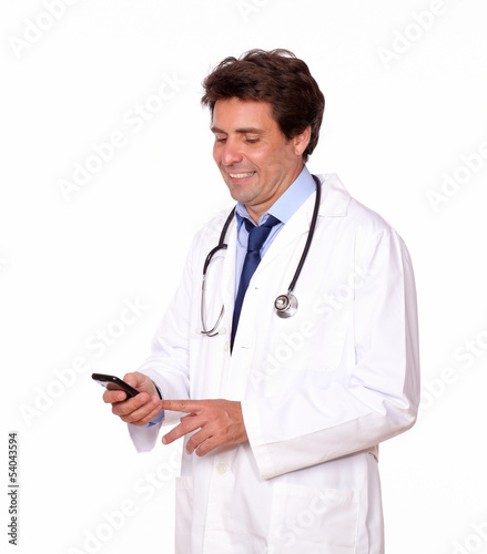 Medical doctor sending message by cellphone