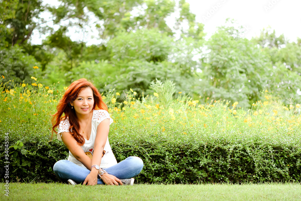 Beautiful woman relax in the garden Beautiful woman relax in the garden