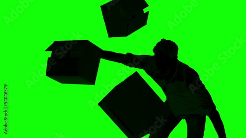 Silhouette of clumsy man dropping boxes on green screen