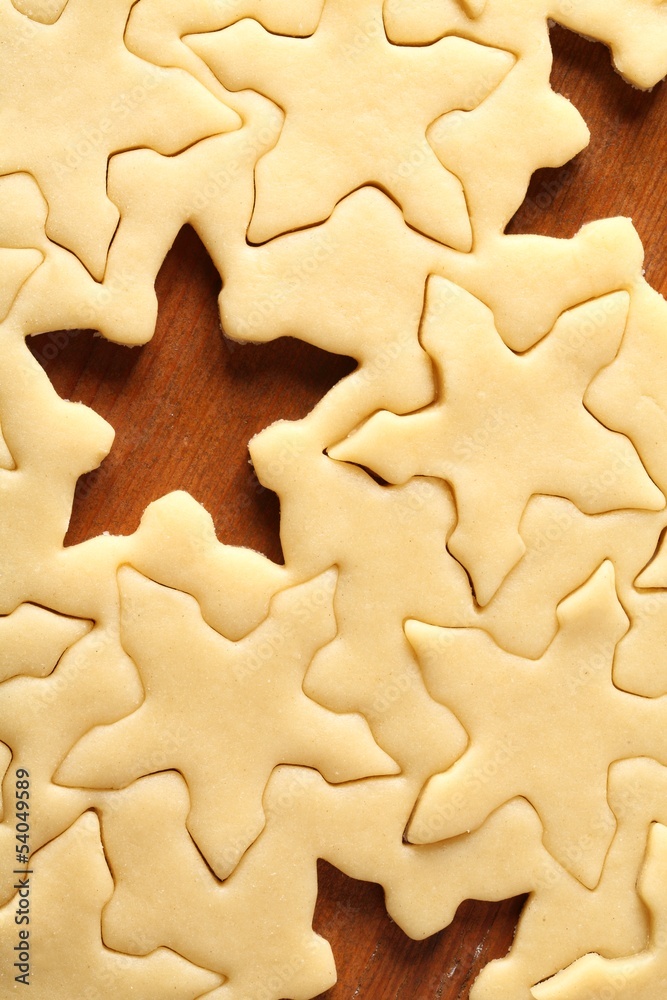 Pastry for Christmas cookies and snowflake shapes. Pastry for Christmas cookies and snowflake shapes.