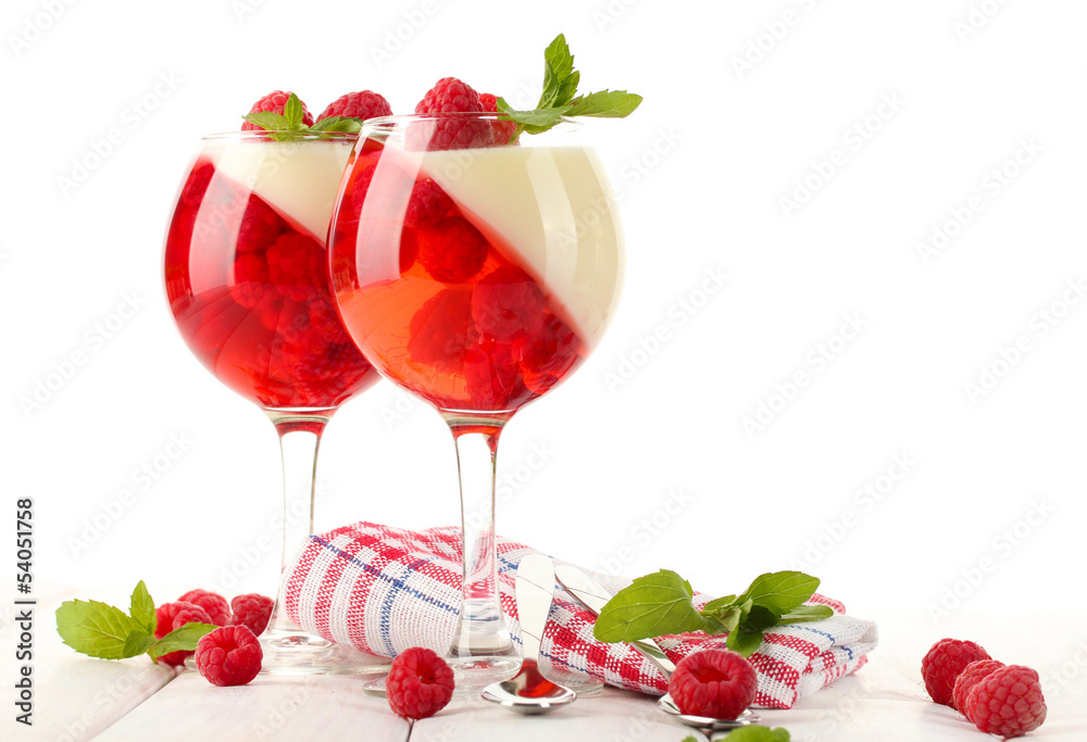 fruit jelly with raspberries in glasses on wooden table fruit jelly with raspberries in glasses on wooden table