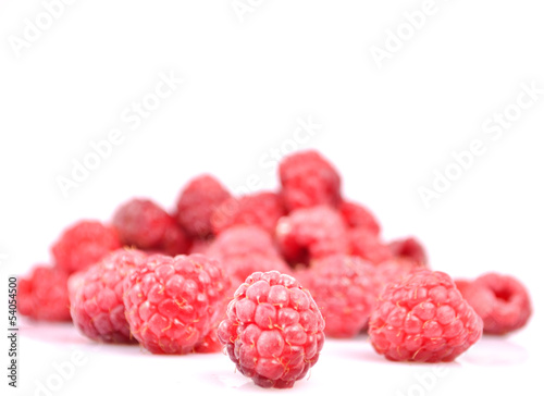 Group of fresh raspberries isolated on white