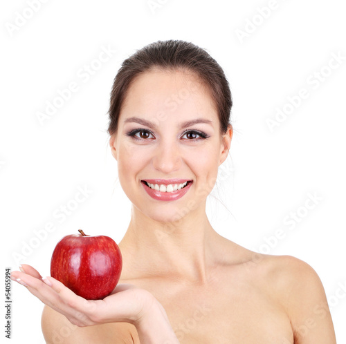 Smiling woman with apple isolated on white