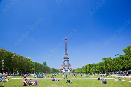 Eiffel Tower, Paris, France. Tourists and localson Champ de Mars