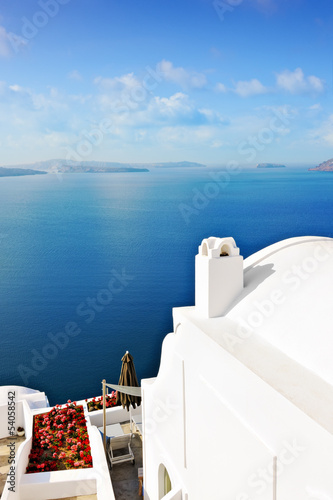 Whitewashed villa overlooking the caldera in Oia