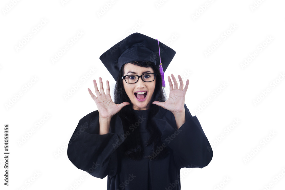Excited female graduate screaming on white Excited female graduate screaming on white