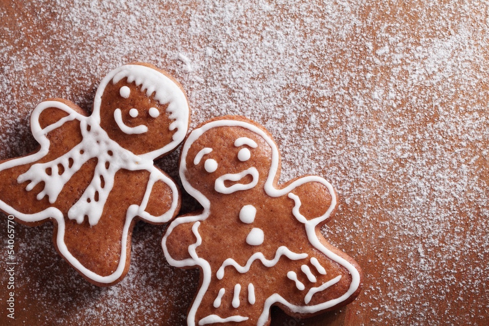 Christmas gingerbread men on sugar background with copy space Christmas gingerbread men on sugar background with copy space