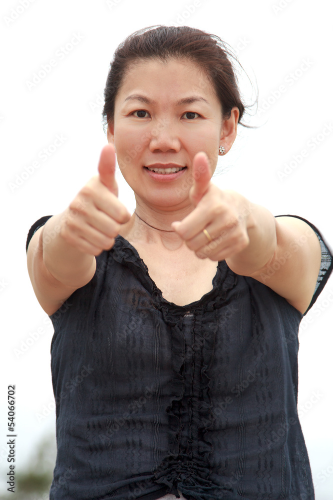 woman showing thumb woman showing thumb