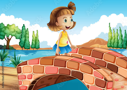 A little girl crossing the bridge