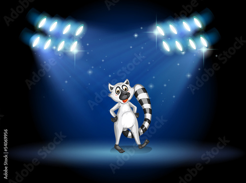 A lemur dancing at the stage with spotlights
