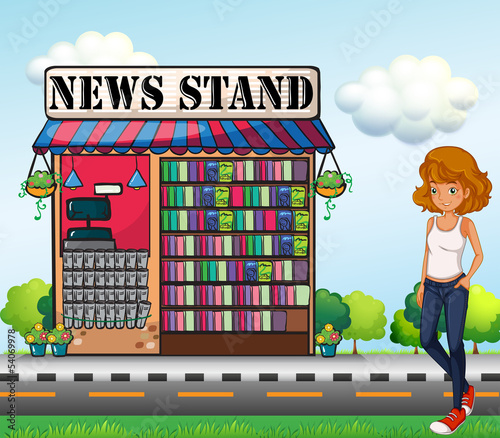 A lady standing beside the news stand