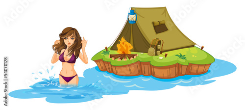 A sexy girl swimming near the island with a camping tent