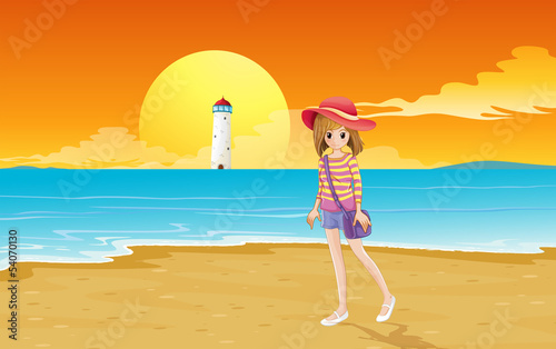 A fashionable young girl at the beach