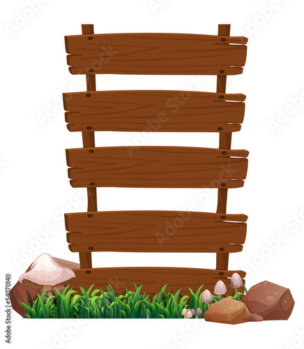 An empty wooden signboard with rocks and mushrooms at the bottom