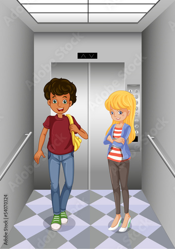 Two teenagers at the elevator