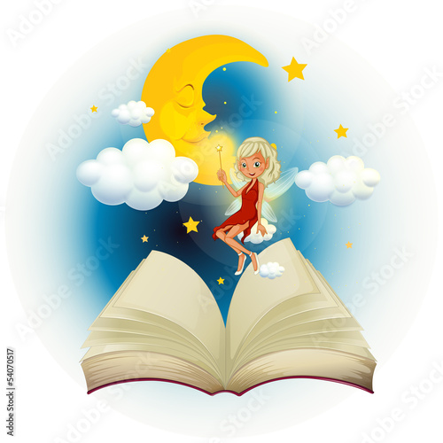 A storybook with a fairy and a sleeping moon
