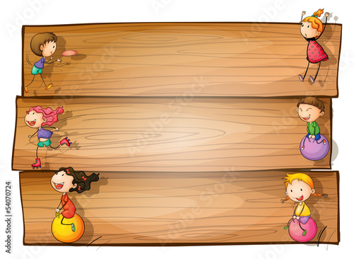 A wooden signage with kids playing