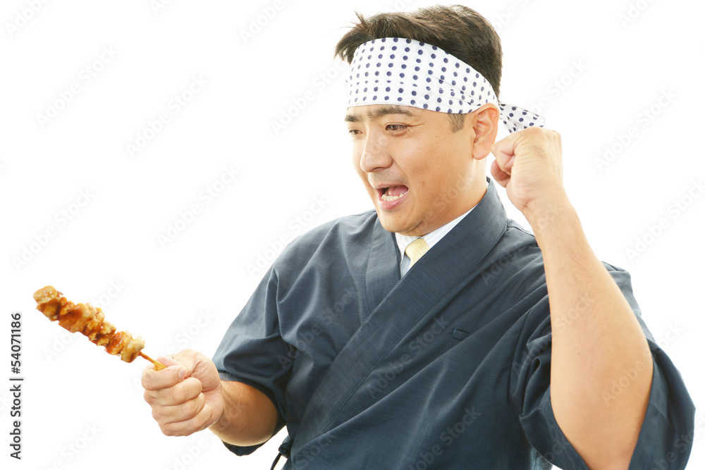 笑顔の焼き鳥屋の主人