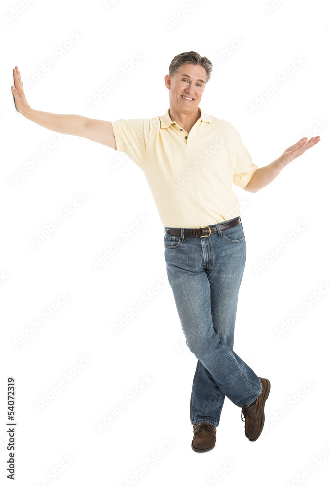 Happy Man Gesturing While Leaning Over White Background Happy Man Gesturing While Leaning Over White Background