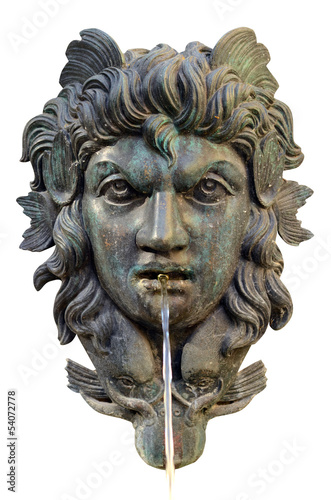Isolation Of An Ornate Water Fountain With Mythological Face