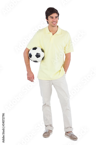 Happy man holding soccer ball