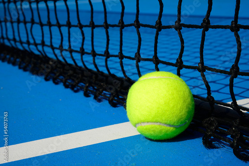 Tennis ball on court © sutichak