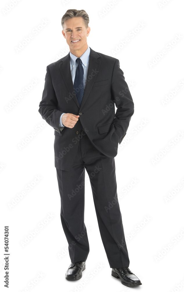Portrait Of Confident Mature Businessman In Formals Portrait Of Confident Mature Businessman In Formals
