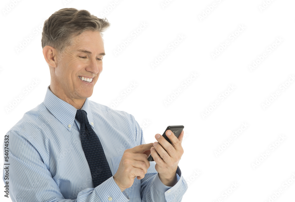 Businessman Text Messaging Through Mobile Phone Businessman Text Messaging Through Mobile Phone