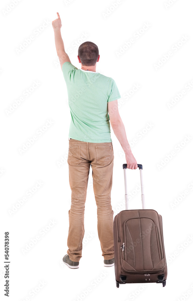 back view of man with suitcase. back view of man with suitcase.