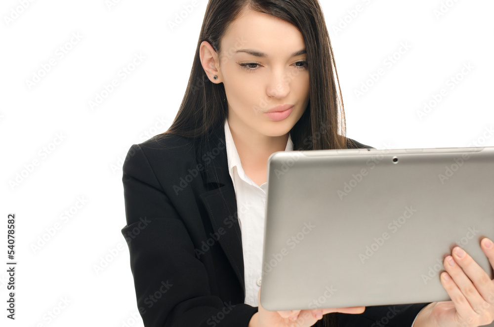 Beautiful business woman using a tablet at work Beautiful business woman using a tablet at work