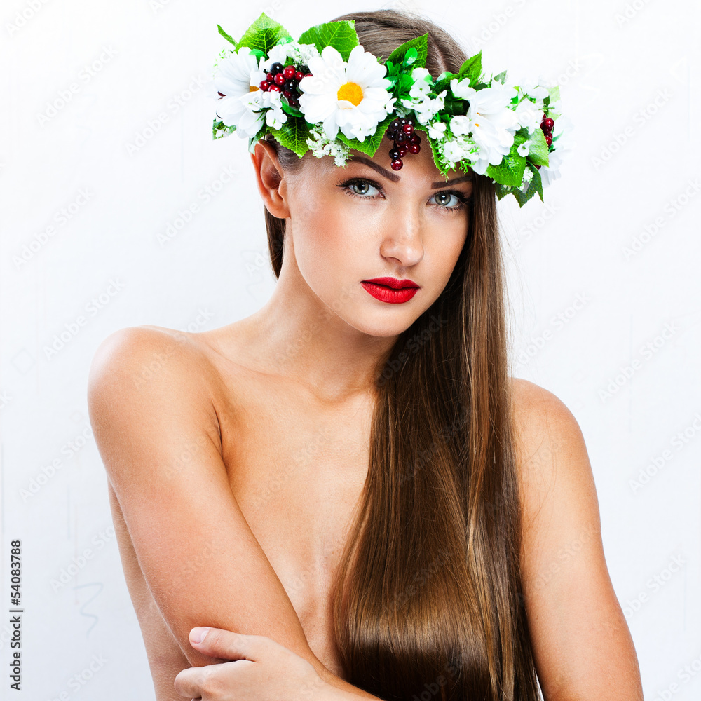 fashion model with  hairstyle and flowers in her hair