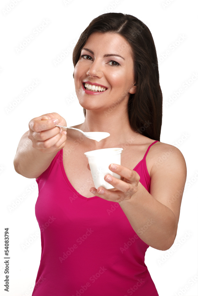 young beautiful smiling woman eating fresh yogurt young beautiful smiling woman eating fresh yogurt