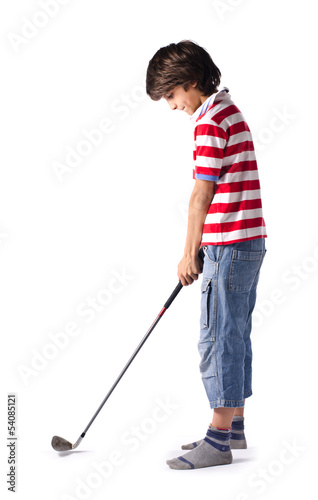 Child ready to hit golf ball with club