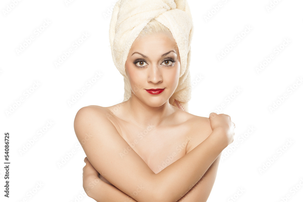 nice and smiling blond girl with a towel on her head nice and smiling blond girl with a towel on her head