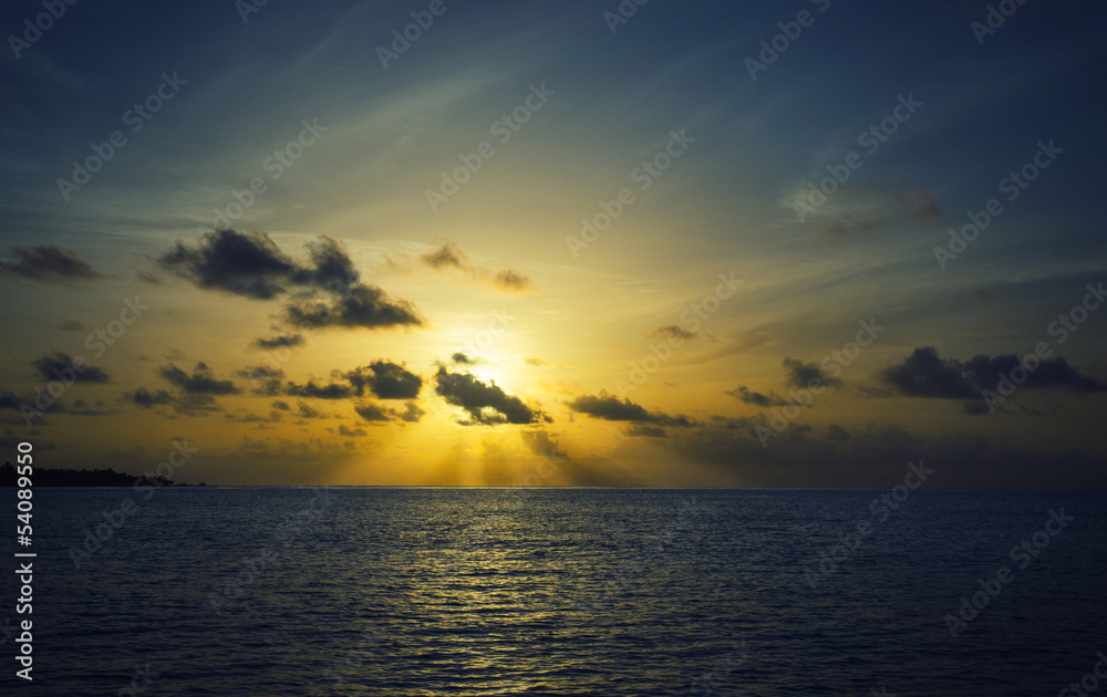 sun goes over the ocean