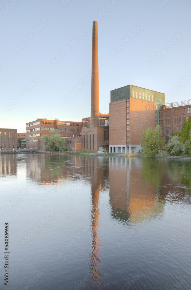 Obraz premium Landscape of an old brick factory and lake in Tampere Finland