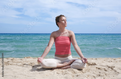 Yoga on the beach in Sardinia