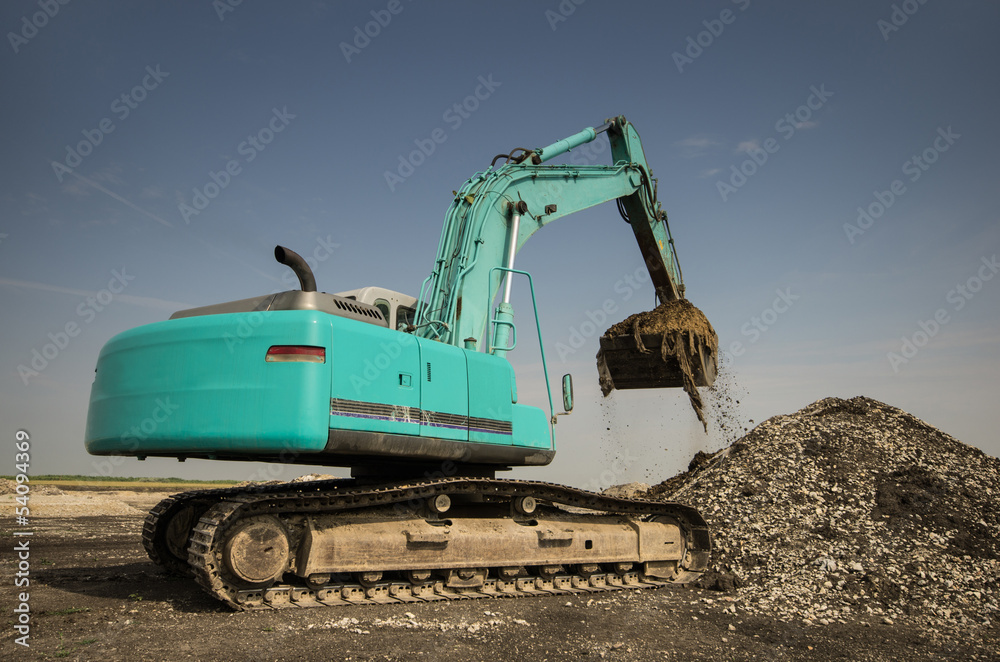dredger digging with bucket