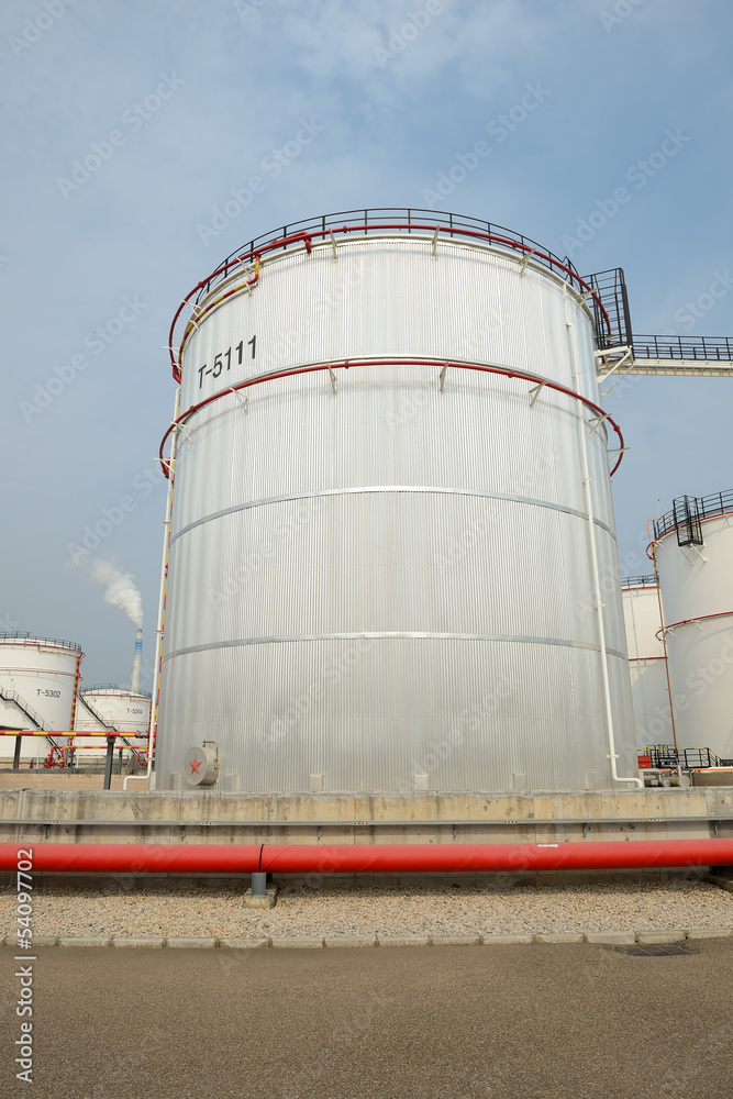 big Industrial oil tanks in a refinery big Industrial oil tanks in a refinery