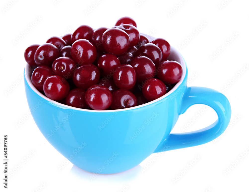 Sweet cherry in cup isolated on white Sweet cherry in cup isolated on white