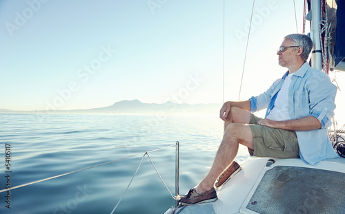 sitting on boat man